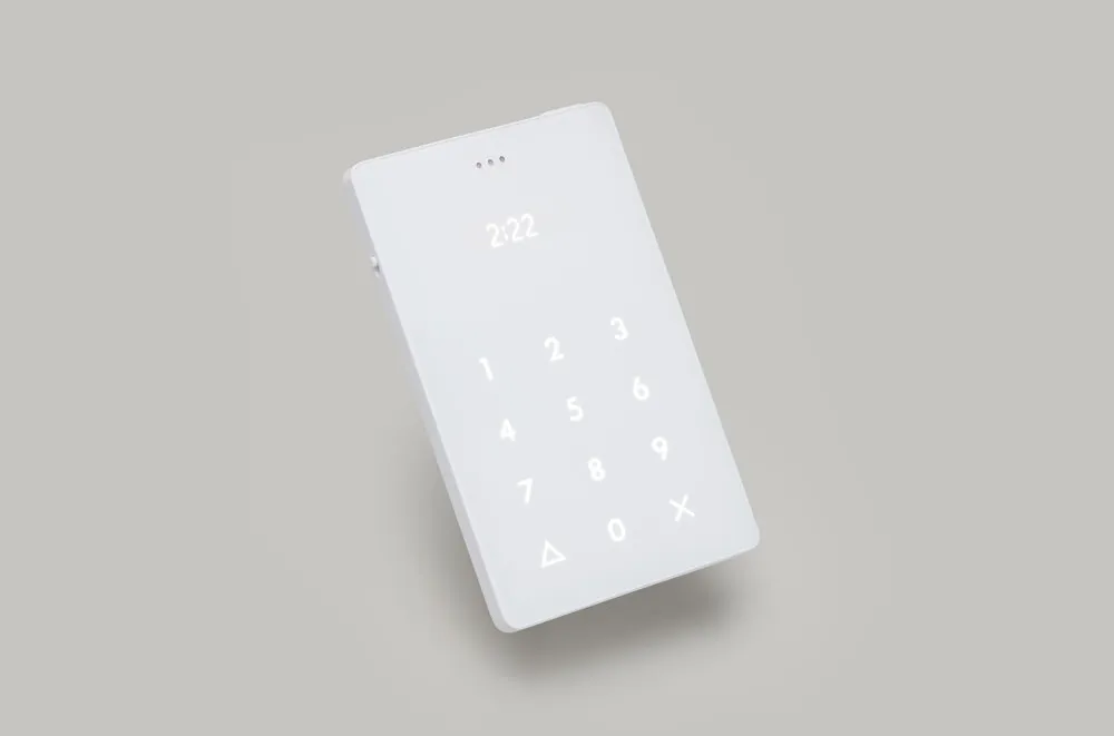 Light Phone III minimalist phone with matte AMOLED e-ink style display showing time and date
